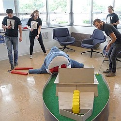 A group of people in a room.